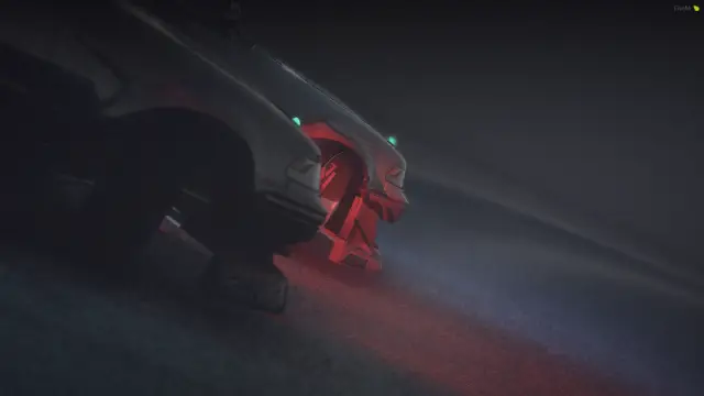 Close-up of a rear wheel throwing red light and smoke
