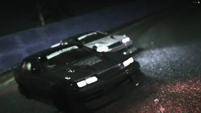 Black drift car on a dark track in the rain